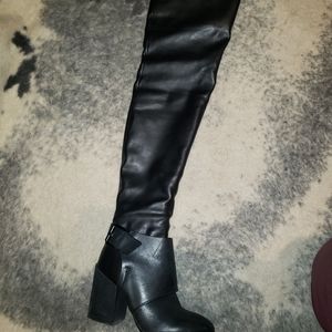 Thigh high stretch boots